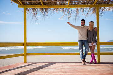 Image showing Couple chating and having fun at beach bar