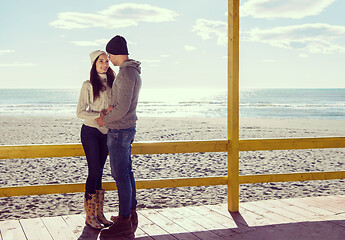 Image showing Couple chating and having fun at beach bar