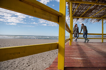 Image showing Couple chating and having fun at beach bar