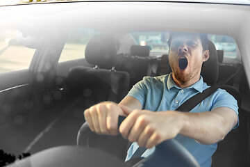 Image showing tired sleepy man or driver driving car and yawning