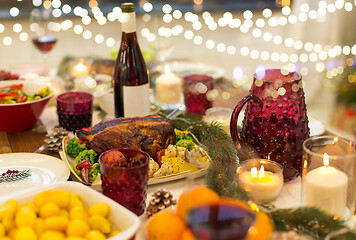 Image showing food and drinks on christmas table at home