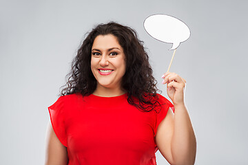 Image showing happy woman in red dress holding speech bubble