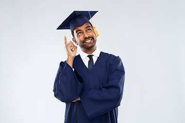 Image showing indian graduate student pointing his finger up