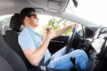 Image showing man or driver with takeaway coffee cup driving car