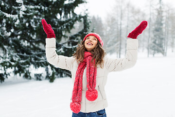 Image showing happy young woman in winter park