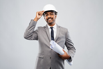 Image showing indian male architect in helmet with blueprints