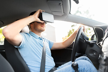 Image showing man or driver wearing vr glasses and driving car