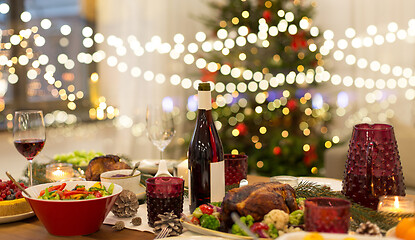 Image showing food and drinks on christmas table at home