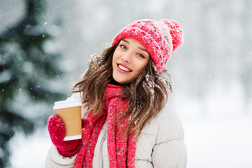 Image showing happy teenage girl with coffee in winter park