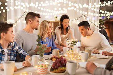 Image showing happy family having birthday party at home