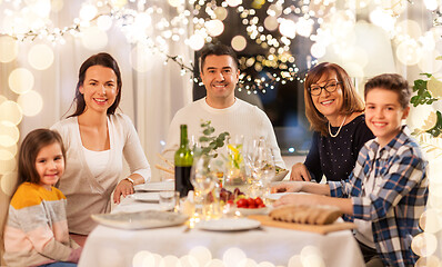 Image showing happy family having dinner party at home