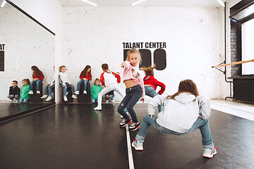 Image showing The kids at dance school. Ballet, hiphop, street, funky and modern dancers