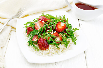 Image showing Salad of strawberry and couscous on wooden board