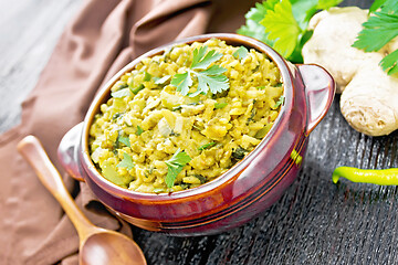 Image showing Kitchari in bowl on wooden board