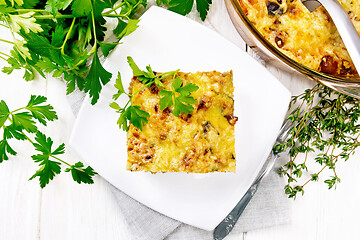 Image showing Casserole of meat and eggplant in plate on board top