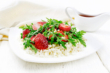 Image showing Salad of strawberry and couscous on light board