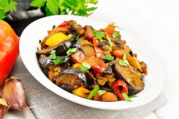 Image showing Ragout with eggplant and pepper on light board