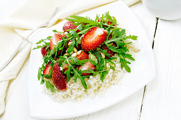 Image showing Salad of strawberry and couscous on board