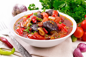 Image showing Ragout vegetable with eggplant on board