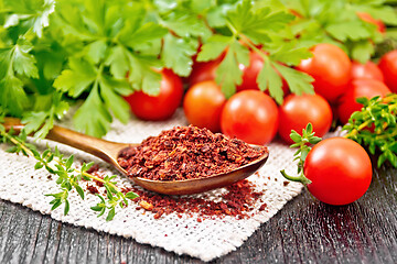 Image showing Tomatoes dried in spoon on board