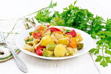 Image showing Ragout vegetable with zucchini on board