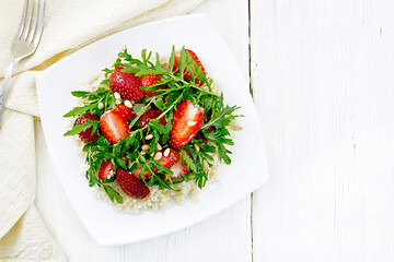 Image showing Salad of strawberry and couscous on light board top