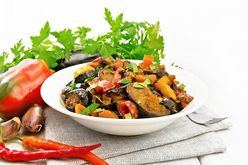 Image showing Ragout with eggplant and pepper on white board