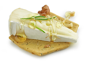 Image showing canape with brie cheese, walnut and rosemary