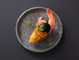 Image showing seafood snack on grey plate