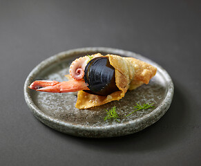 Image showing seafood snack on grey plate