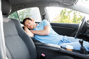 Image showing tired man or driver sleeping in car