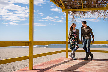 Image showing Couple chating and having fun at beach bar