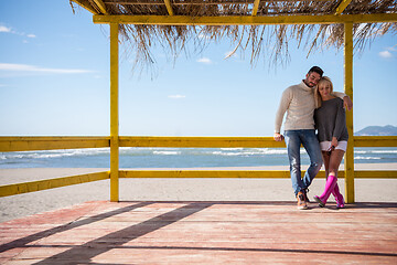 Image showing Couple chating and having fun at beach bar