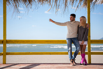 Image showing Couple chating and having fun at beach bar