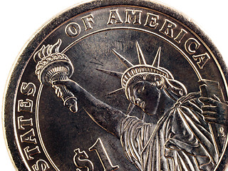 Image showing Closeup detail of US one dollar gold coin tail