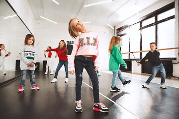 Image showing The kids at dance school. Ballet, hiphop, street, funky and modern dancers