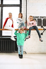 Image showing The kids at dance school. Ballet, hiphop, street, funky and modern dancers