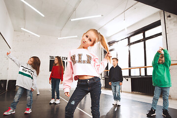 Image showing The kids at dance school. Ballet, hiphop, street, funky and modern dancers