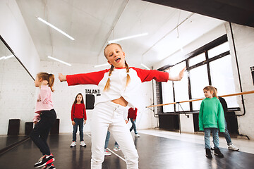 Image showing The kids at dance school. Ballet, hiphop, street, funky and modern dancers