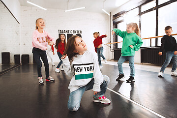 Image showing The kids at dance school. Ballet, hiphop, street, funky and modern dancers