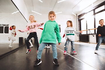 Image showing The kids at dance school. Ballet, hiphop, street, funky and modern dancers