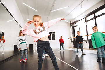 Image showing The kids at dance school. Ballet, hiphop, street, funky and modern dancers