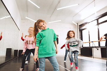 Image showing The kids at dance school. Ballet, hiphop, street, funky and modern dancers