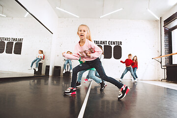 Image showing The kids at dance school. Ballet, hiphop, street, funky and modern dancers