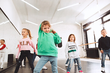 Image showing The kids at dance school. Ballet, hiphop, street, funky and modern dancers