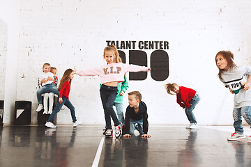 Image showing The kids at dance school. Ballet, hiphop, street, funky and modern dancers