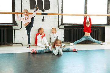 Image showing The kids at dance school. Ballet, hiphop, street, funky and modern dancers