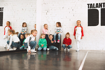 Image showing The kids at dance school. Ballet, hiphop, street, funky and modern dancers