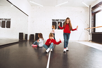 Image showing The kids at dance school. Ballet, hiphop, street, funky and modern dancers