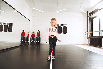 Image showing The kids at dance school. Ballet, hiphop, street, funky and modern dancers